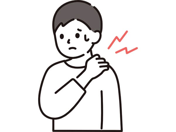 肩が痛む男性