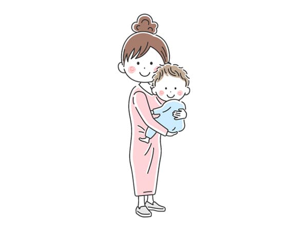 赤ちゃんを抱っこするお母さん