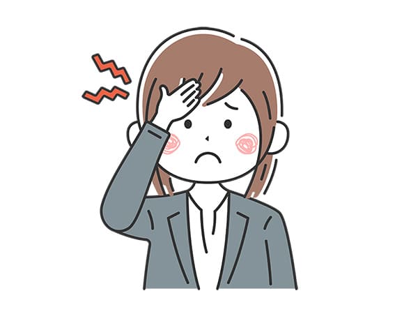 頭が痛い女性