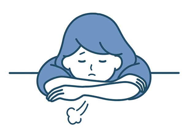 ため息つく女性